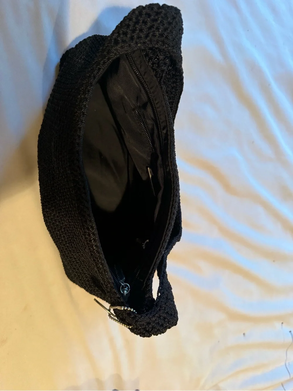 The Sak Black Crochet Shoulder Bag with Gold Charm